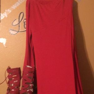 Red off the shoulder dress with a slide split.